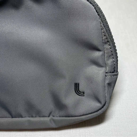 Lole Belt Bag. Minimalist Design. Charcoal Grey. Logo on belt. Adjustable - Picture 6 of 9